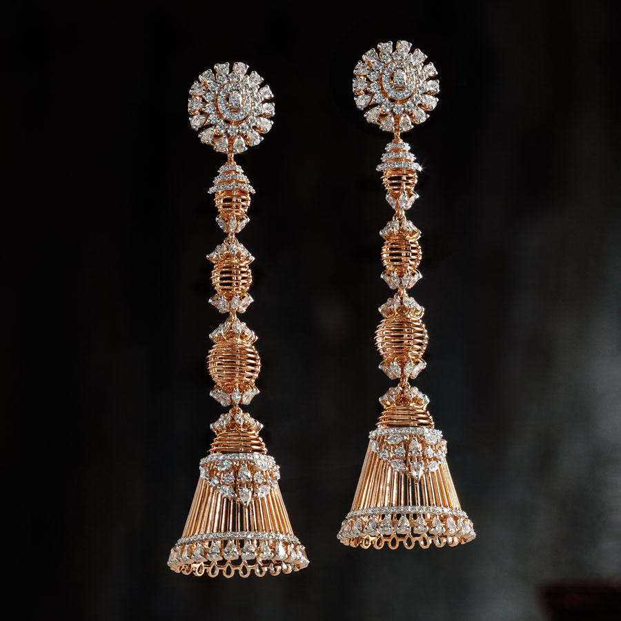 Rose Gold and Diamond Jhumkis on a dark background