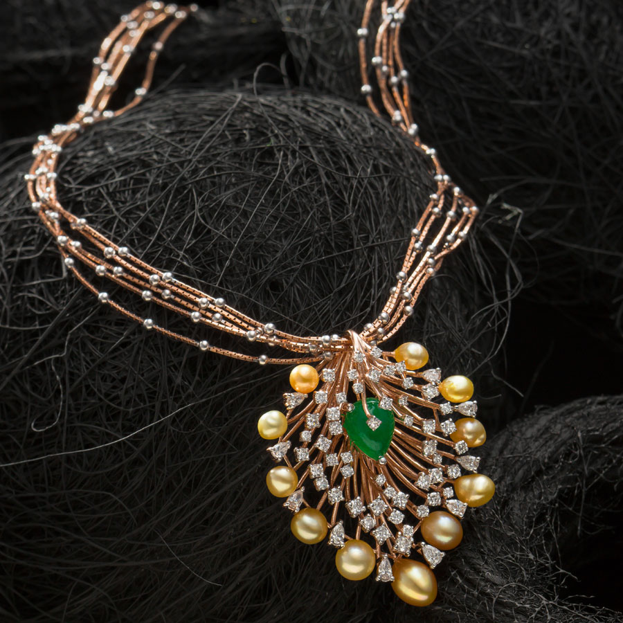 Diamond, Rose Gold with Emerald String Pendant on a black background