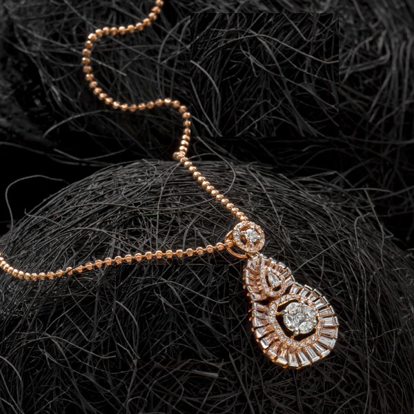 Hexagonal Diamond and Rose Gold Pendant on a dark background