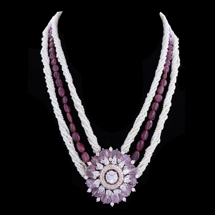 Diamond and Pearls Necklace placed on a black backdrop