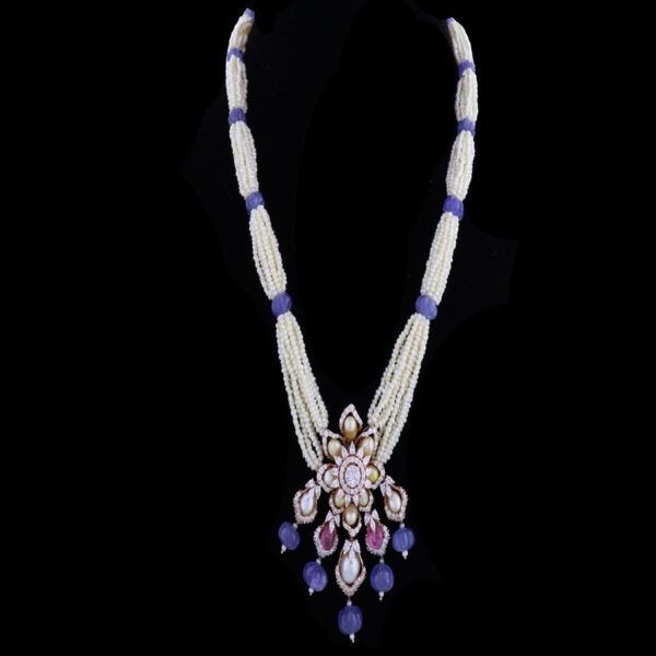 White and Purple Floral Pearls and Diamond Pendant on a black background